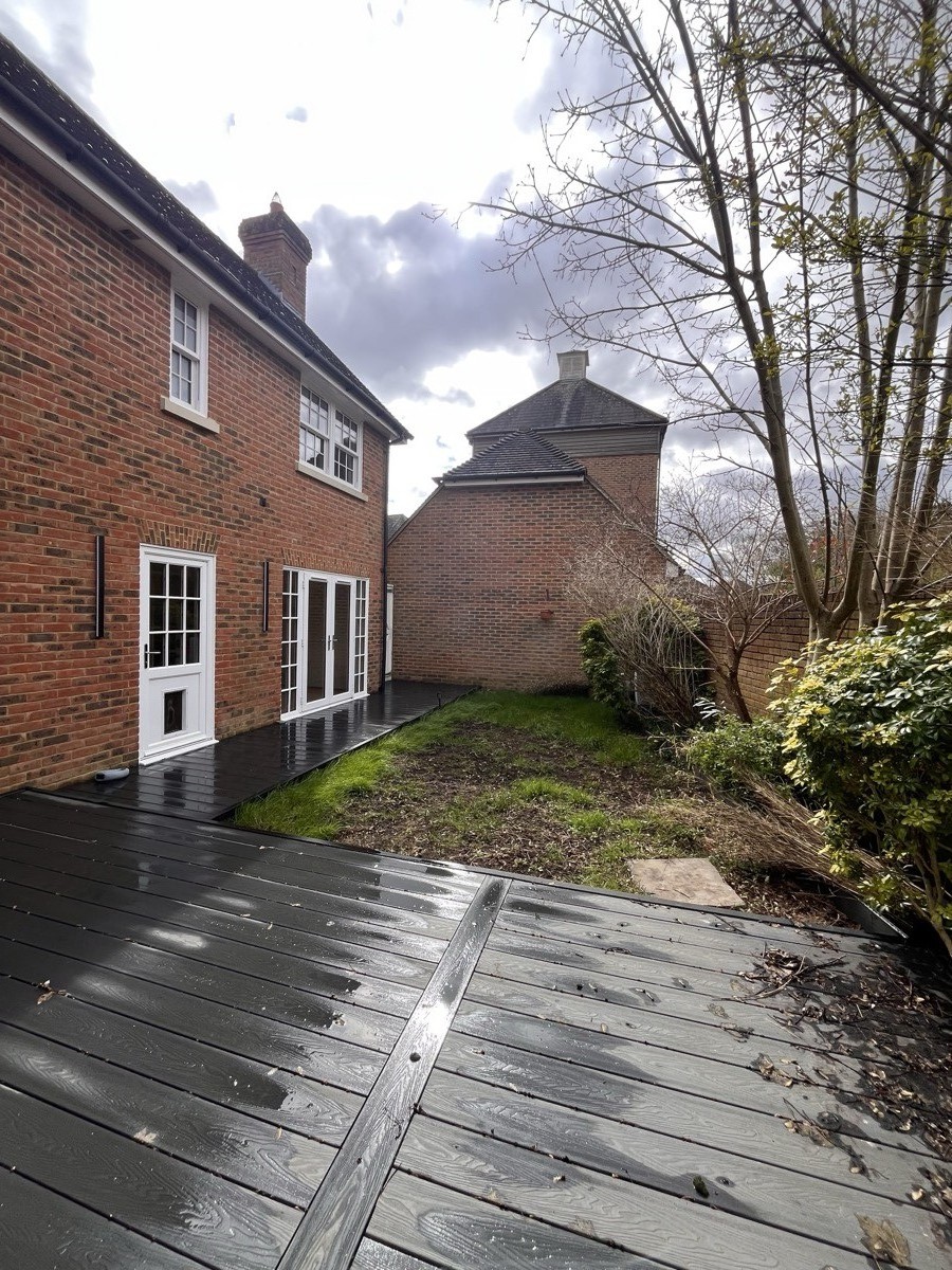 Red brick semi-detached house assessed by Kubo EPC, showing classic 1930s cavity wall construction
